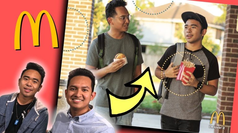 Deux jeunes accrochent un poster d&rsquo;eux-mêmes dans un McDo